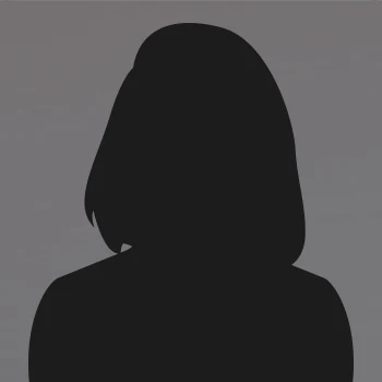 Silhouette of a woman with shoulder-length hair against a gray background.