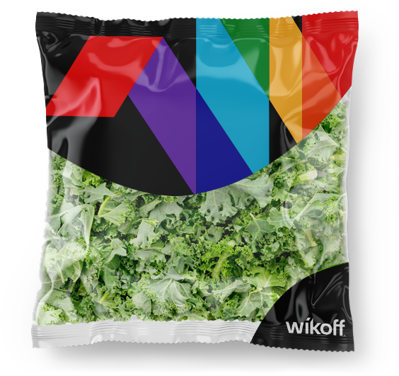 A sealed plastic bag of chopped leafy greens labeled “wikoff” with a colorful geometric design on the packaging.