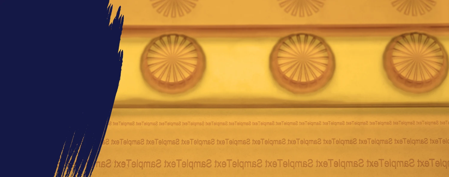 A yellow wall with circular decorative patterns; a dark blue paint streak covers the left side, and faint repeated text appears at the bottom.